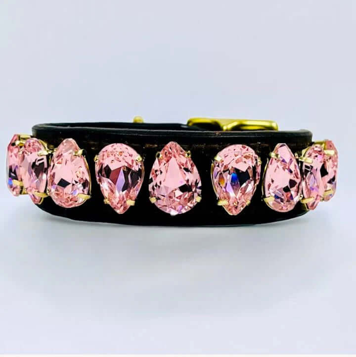 Luxury black leather bracelet adorned with sparkling pink gemstones for a stylish look