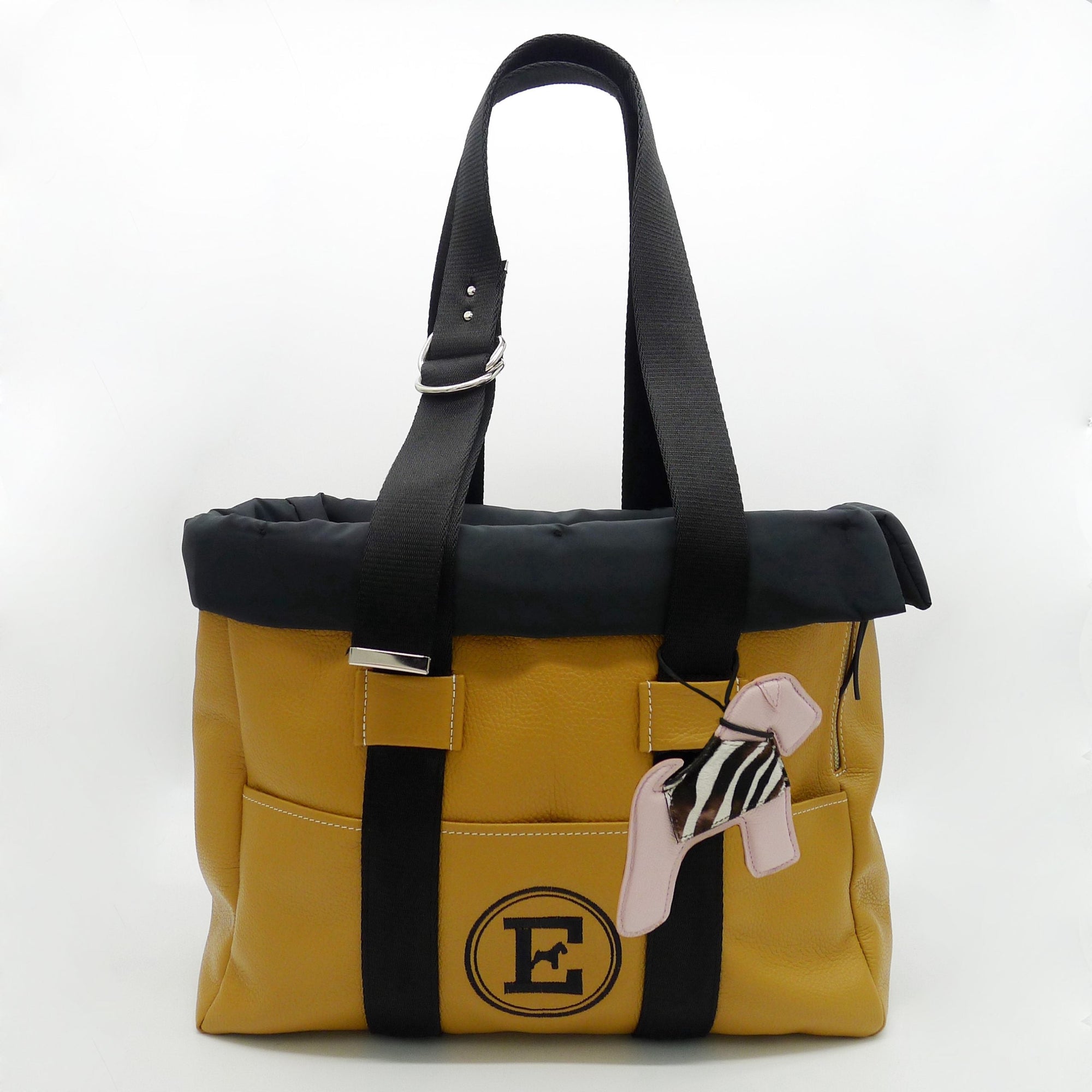 Emma Firenze collection featuring luxury Italian-designed pet apparel, collars, leashes, and elegant pet accessories