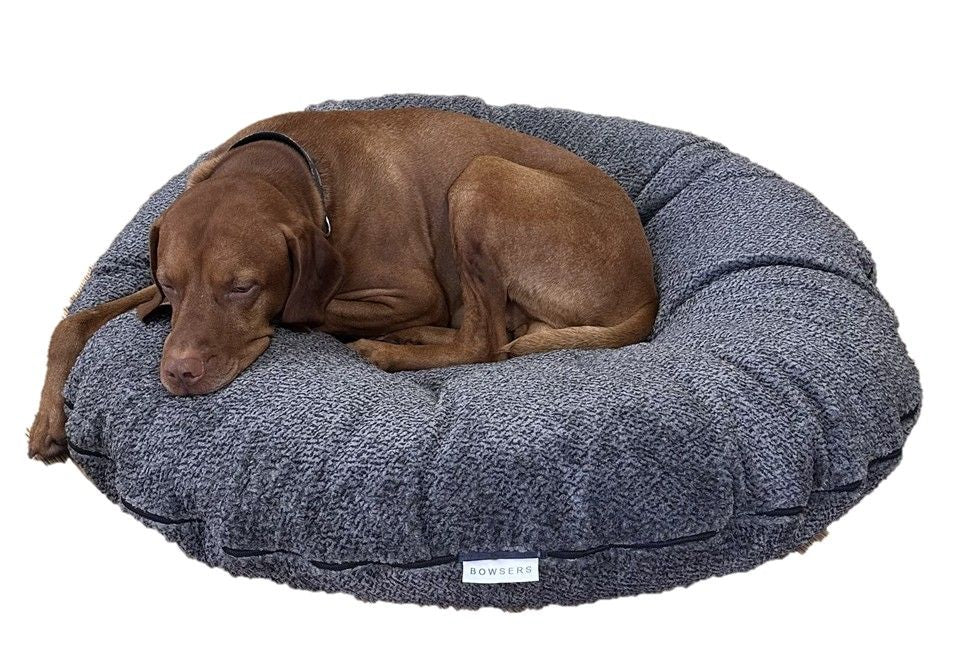 Luxurious Bessie and Barnie donut dog bed in faux fur with plush bolsters, perfect for large dogs