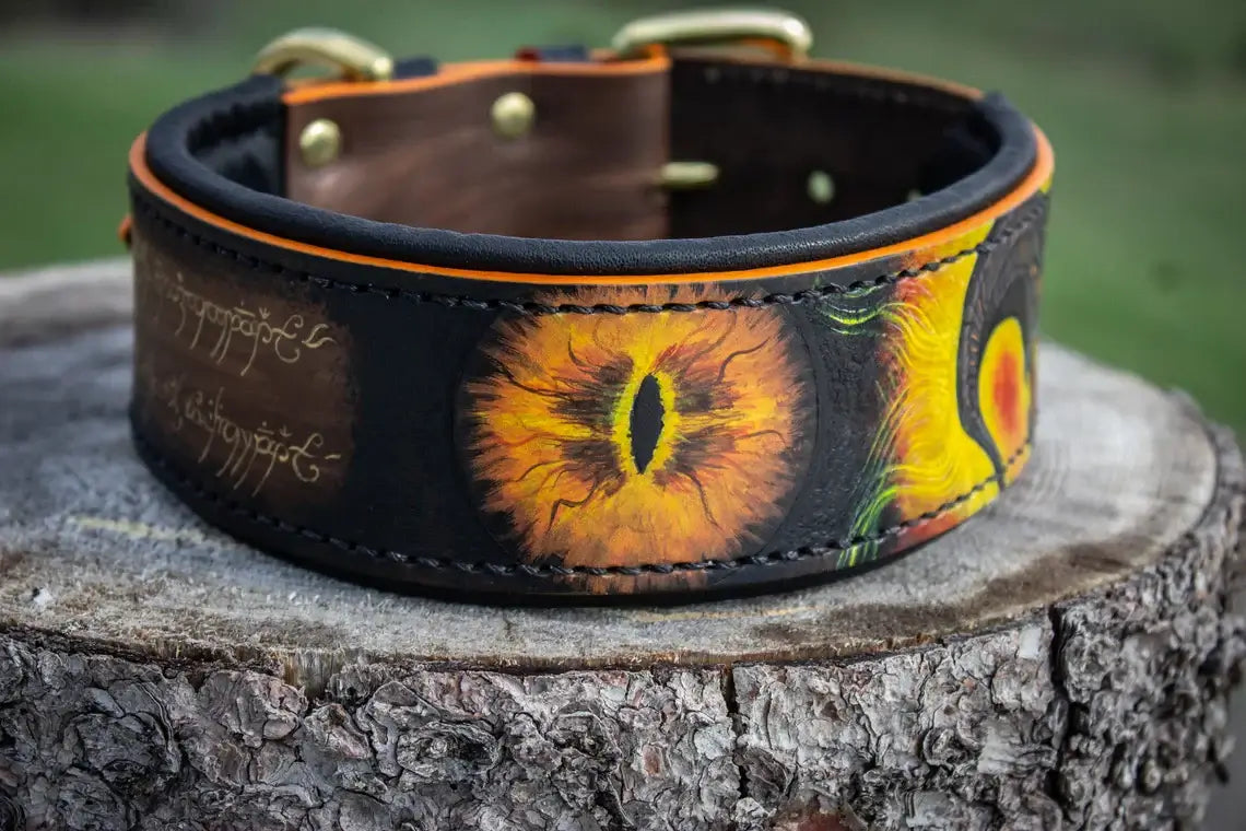Designer dog collar from Adam's Leather collection featuring sunflower design and high-quality craftsmanship on a wooden stump.