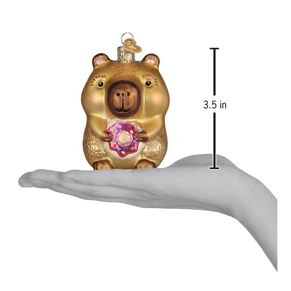Old World Christmas: Capybara Eating Donut Christmas Ornament