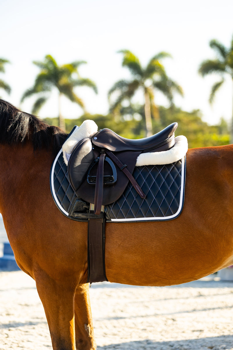 San Eligius black quilted jump saddle pad with white and black crocodile piping