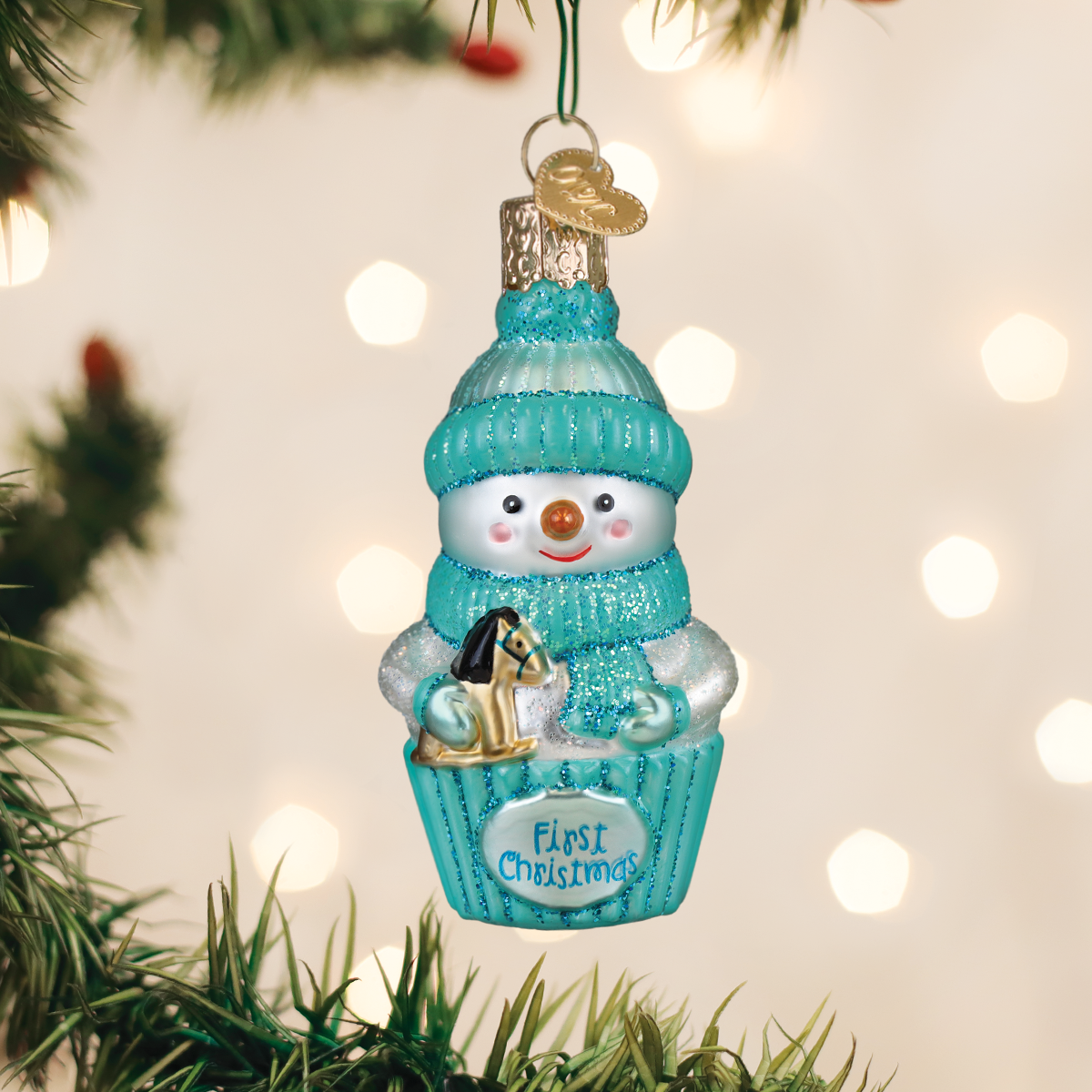 Old World Christmas: Snow Baby Cupcake Boy Christmas Ornament