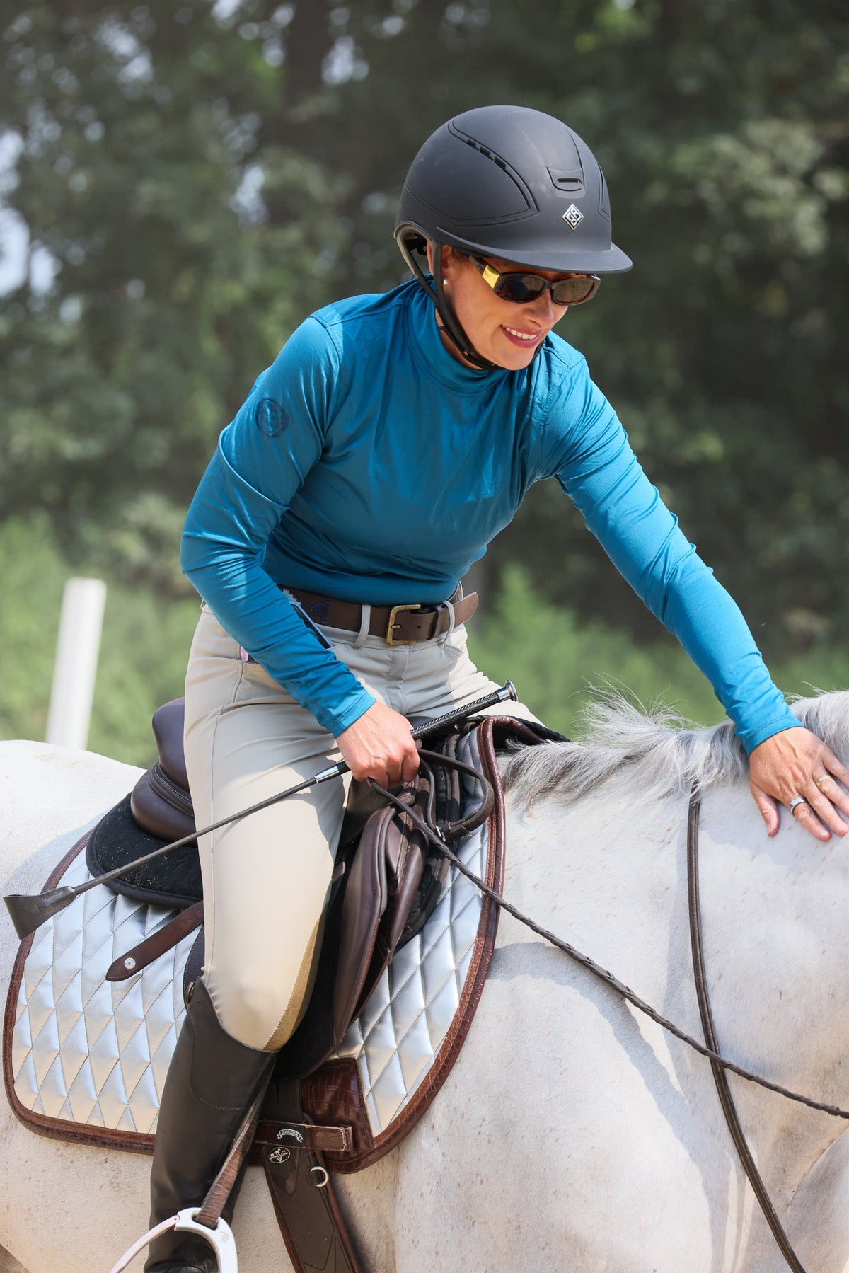 San Eligius chrome quilted jump saddle pad with brown crocodile piping, full front view