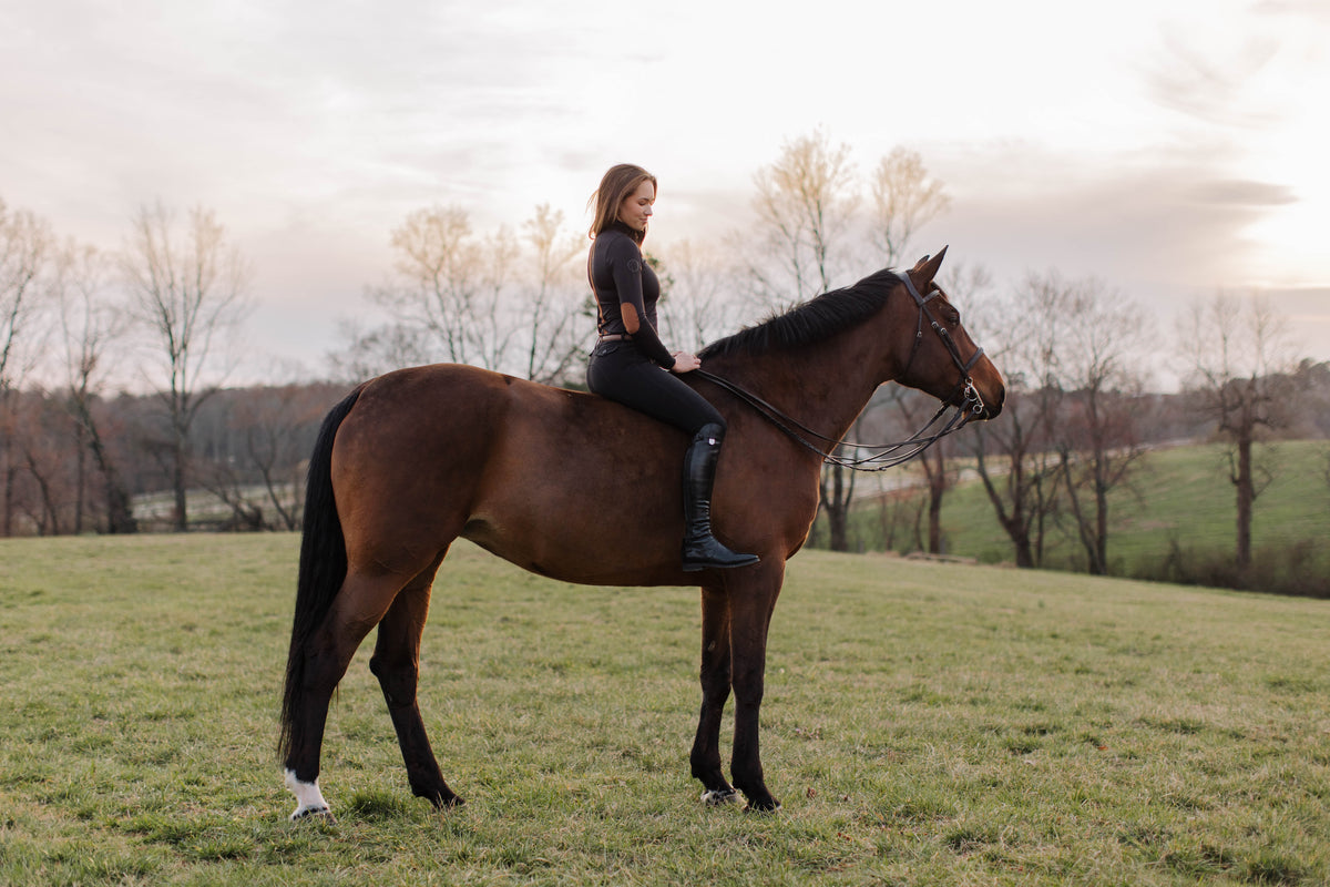 San Eligius black Blair riding top, turtleneck with elbow patches, elbow patch close-up