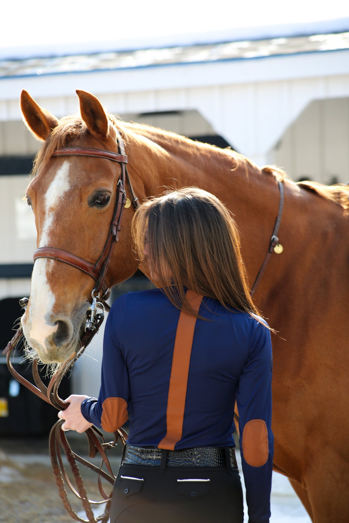 San Eligius navy Blair riding top, turtleneck with elbow patches on model