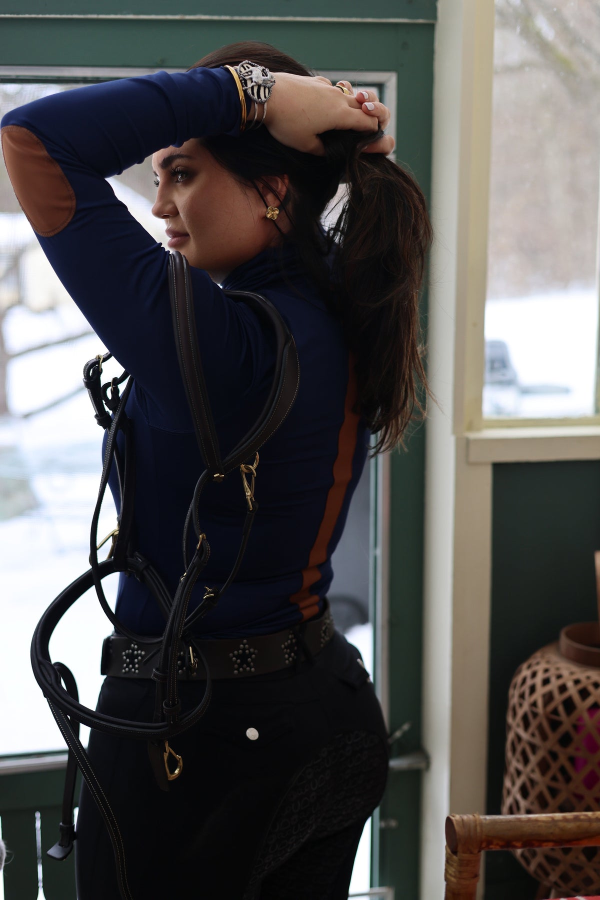 San Eligius navy Blair riding top, turtleneck with elbow patches on model