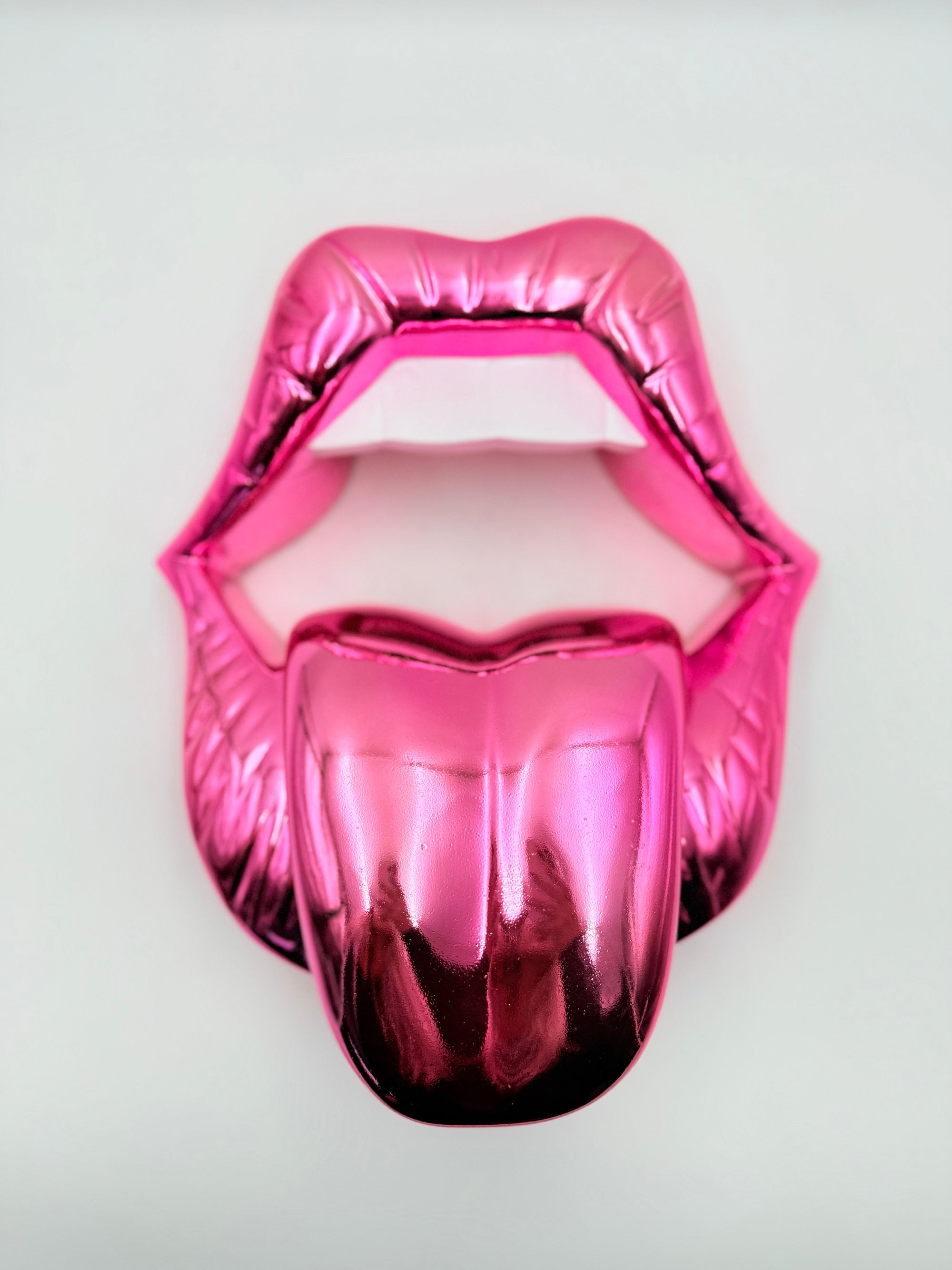 And Iconic Candy Pink Chrome Kiss Wall Sculpture