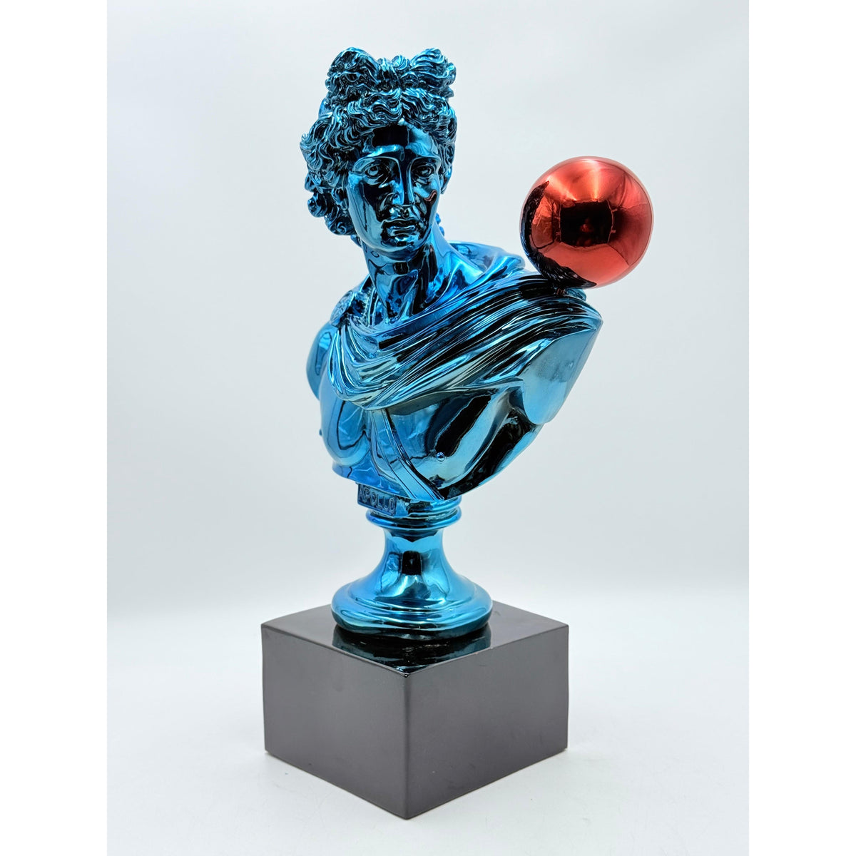 And Iconic Apollo Sculpture Blue Chrome with Red Balloon