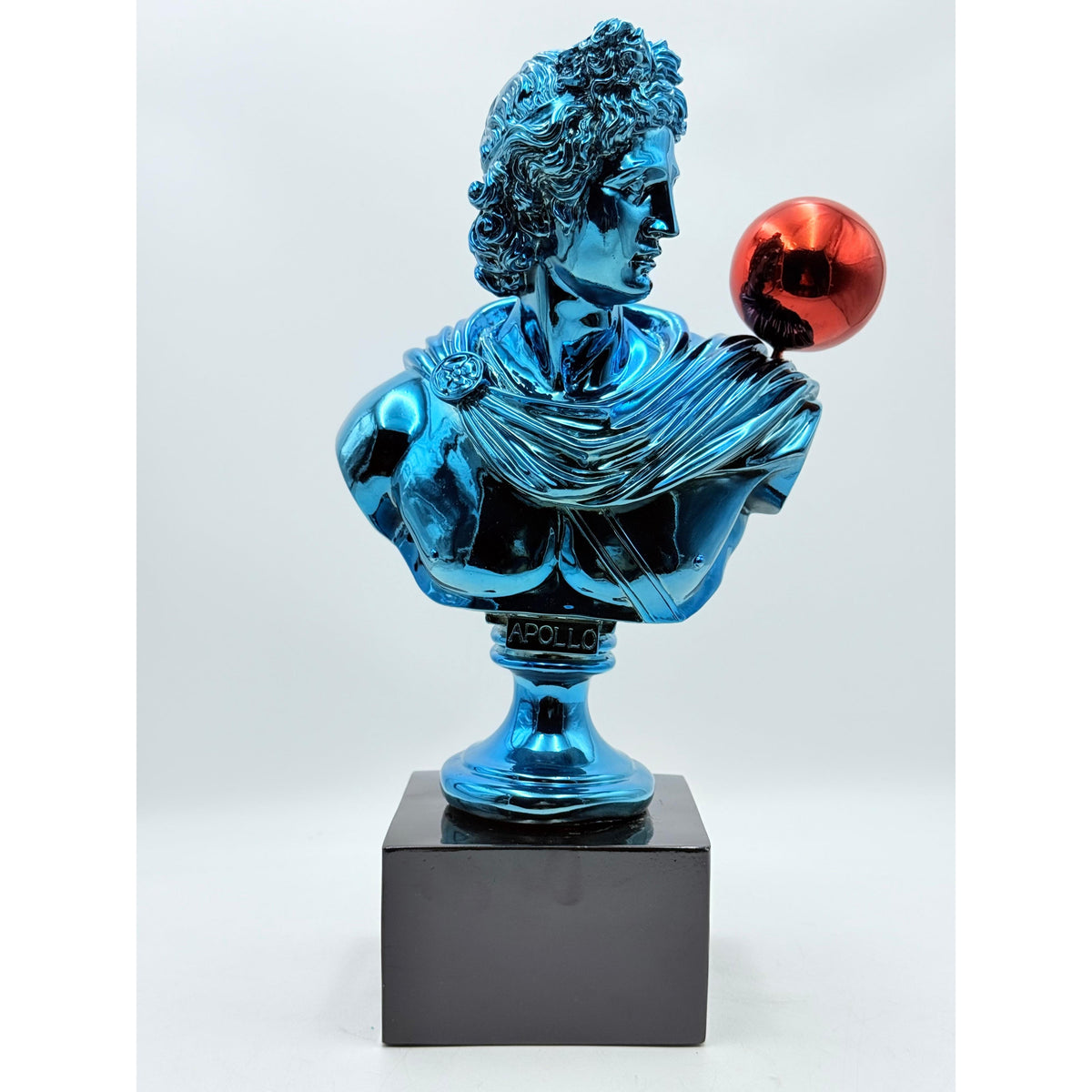 And Iconic Apollo Sculpture Blue Chrome with Red Balloon