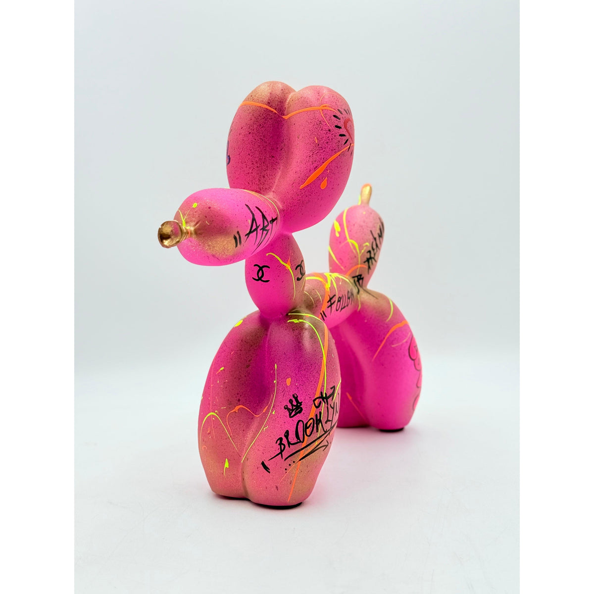 And Iconic Pink Balloon Dog Follow Your Dreams Sculpture