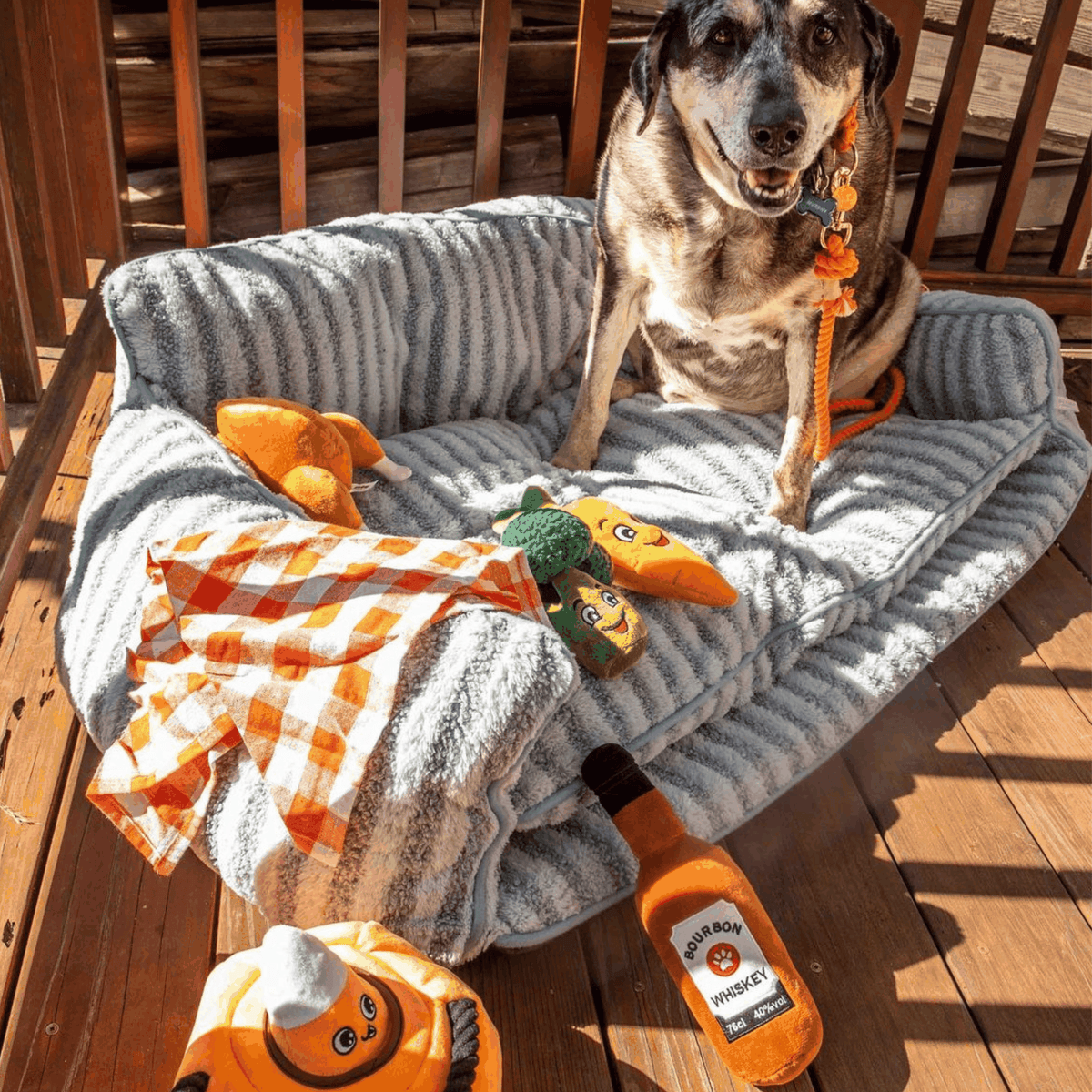 Glow Pups: Bourbon Whiskey Squeaky Plush Dog Toy