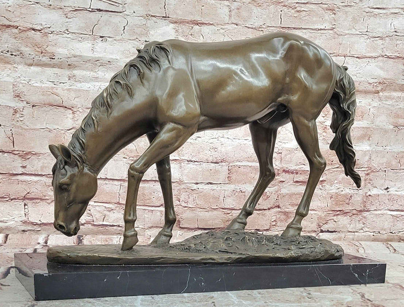 Grazing Horse Bronze Sculpture with Naturalistic Detail on Black Marble Base