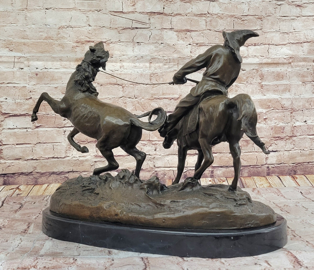 A Bronze Sculpture of Breaking in a Wild Horse, Signed E. Nahcepe Hand Made