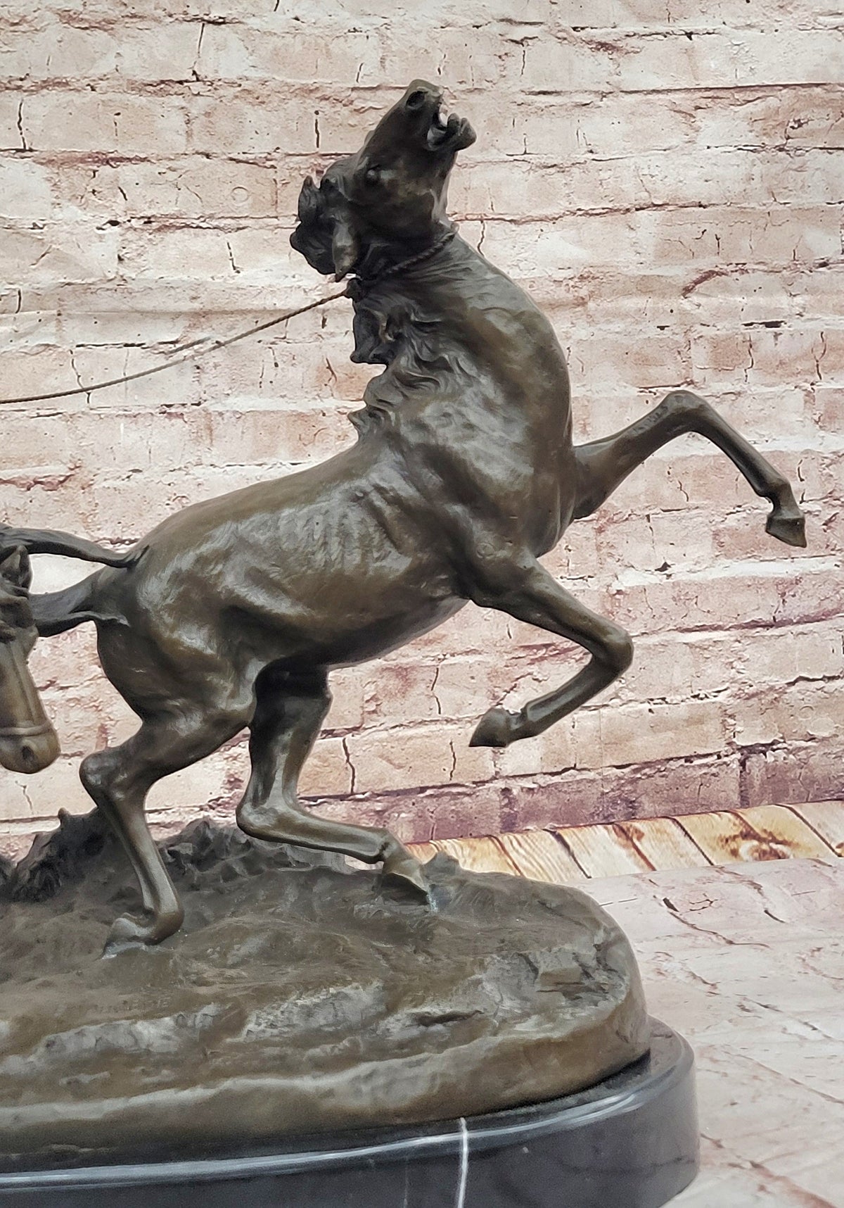 A Bronze Sculpture of Breaking in a Wild Horse, Signed E. Nahcepe Hand Made