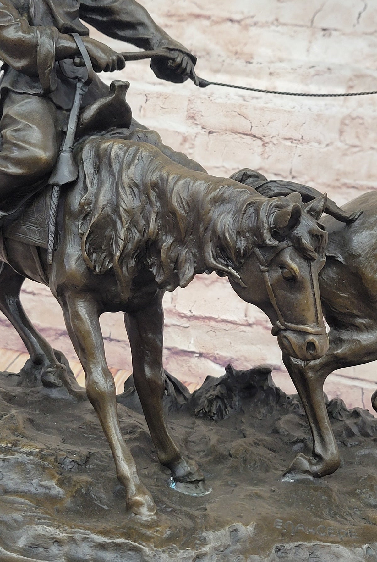 A Bronze Sculpture of Breaking in a Wild Horse, Signed E. Nahcepe Hand Made