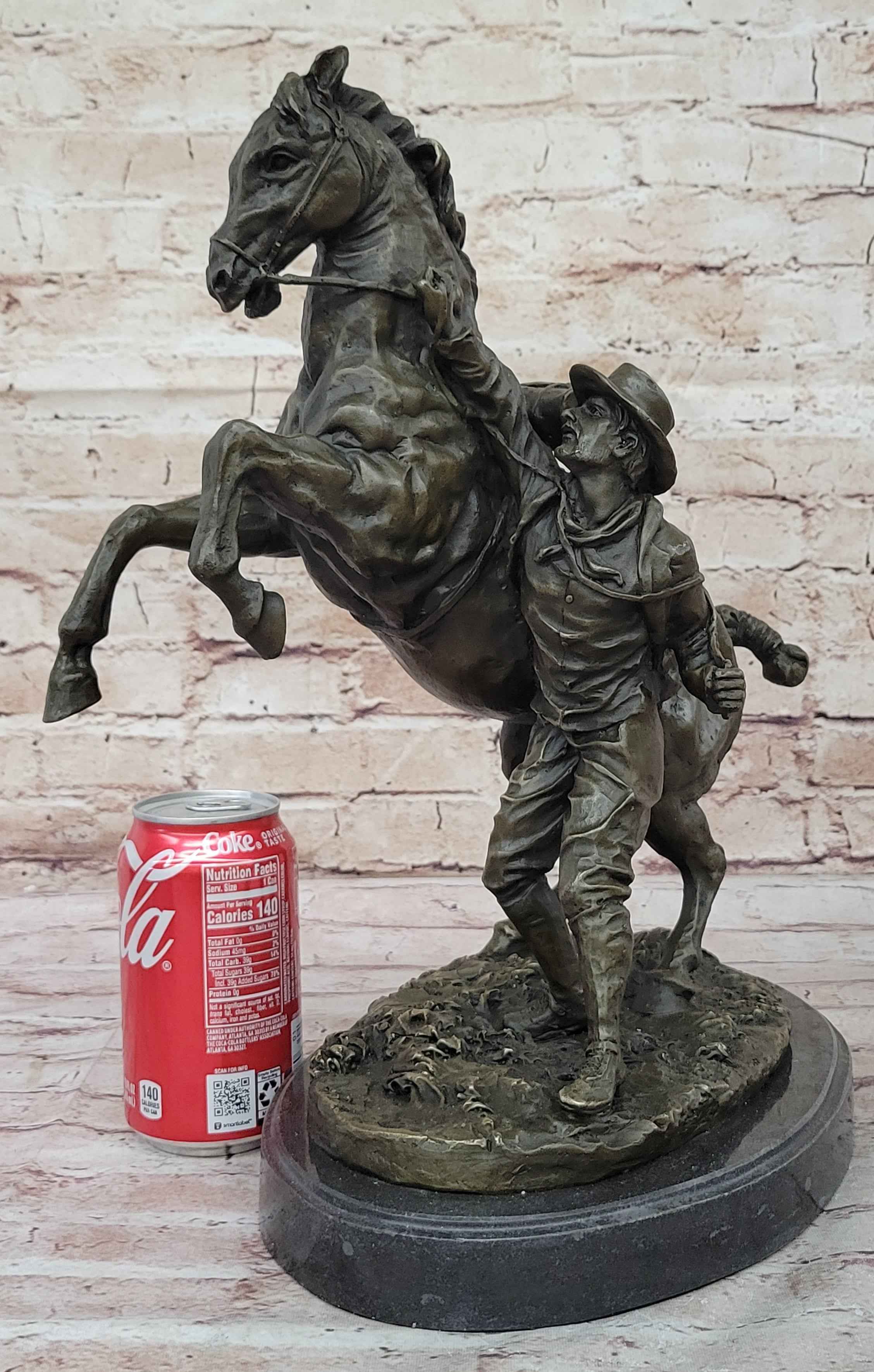 Bronze Sculpture of Cowboy Taming a Rearing Horse – Western Art