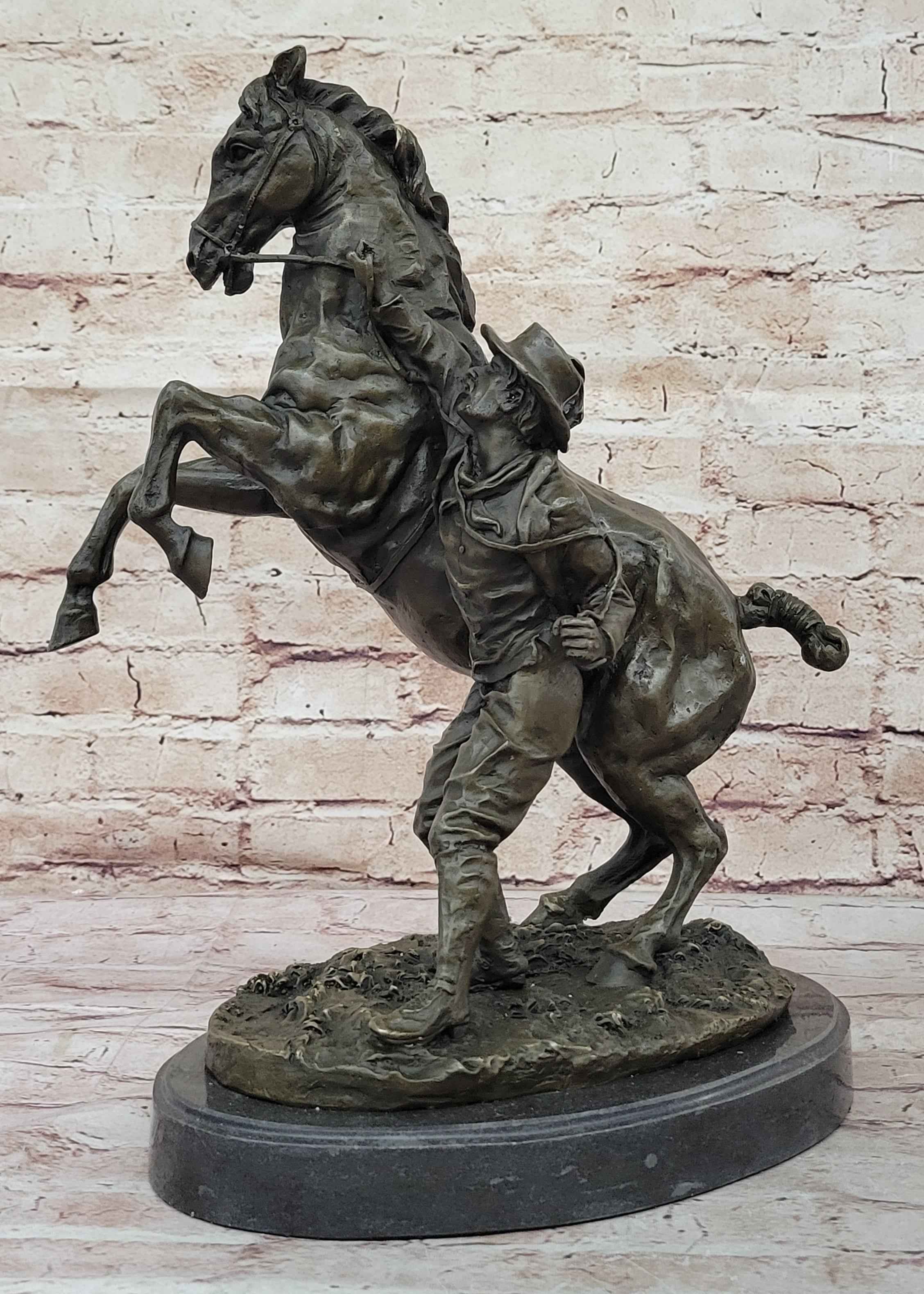 Bronze Sculpture of Cowboy Taming a Rearing Horse – Western Art
