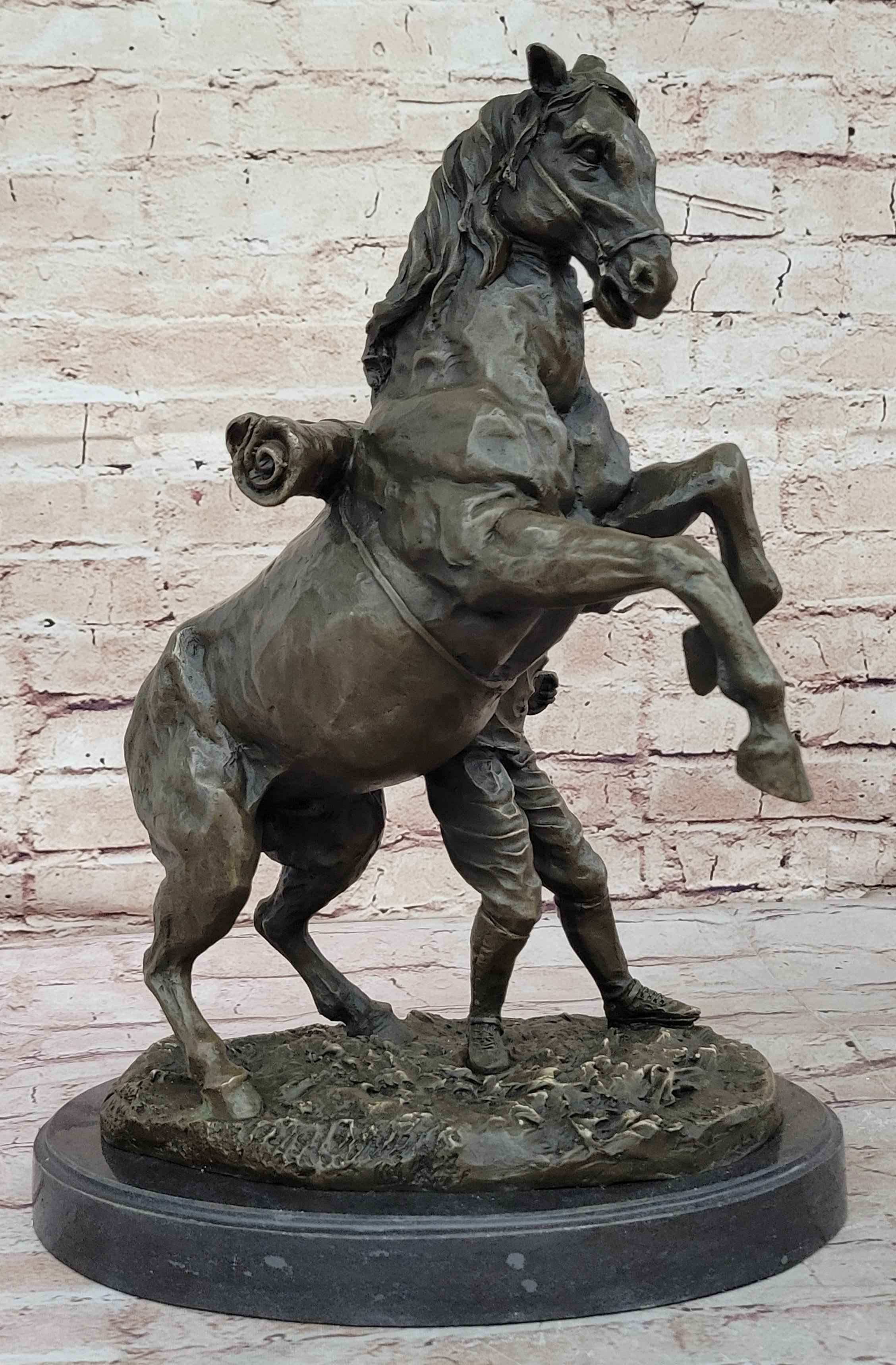 Bronze Sculpture of Cowboy Taming a Rearing Horse – Western Art
