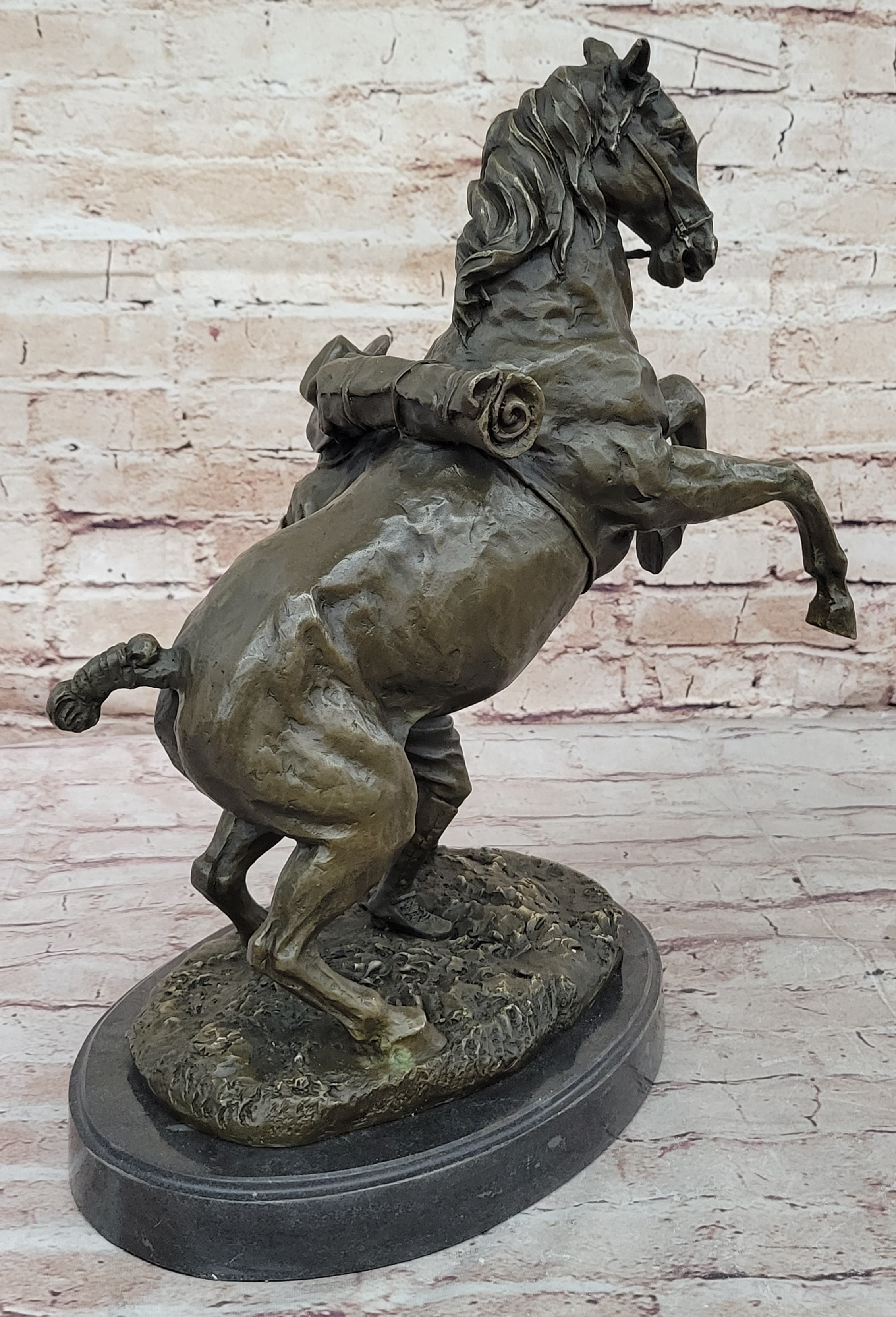 Bronze Sculpture of Cowboy Taming a Rearing Horse – Western Art