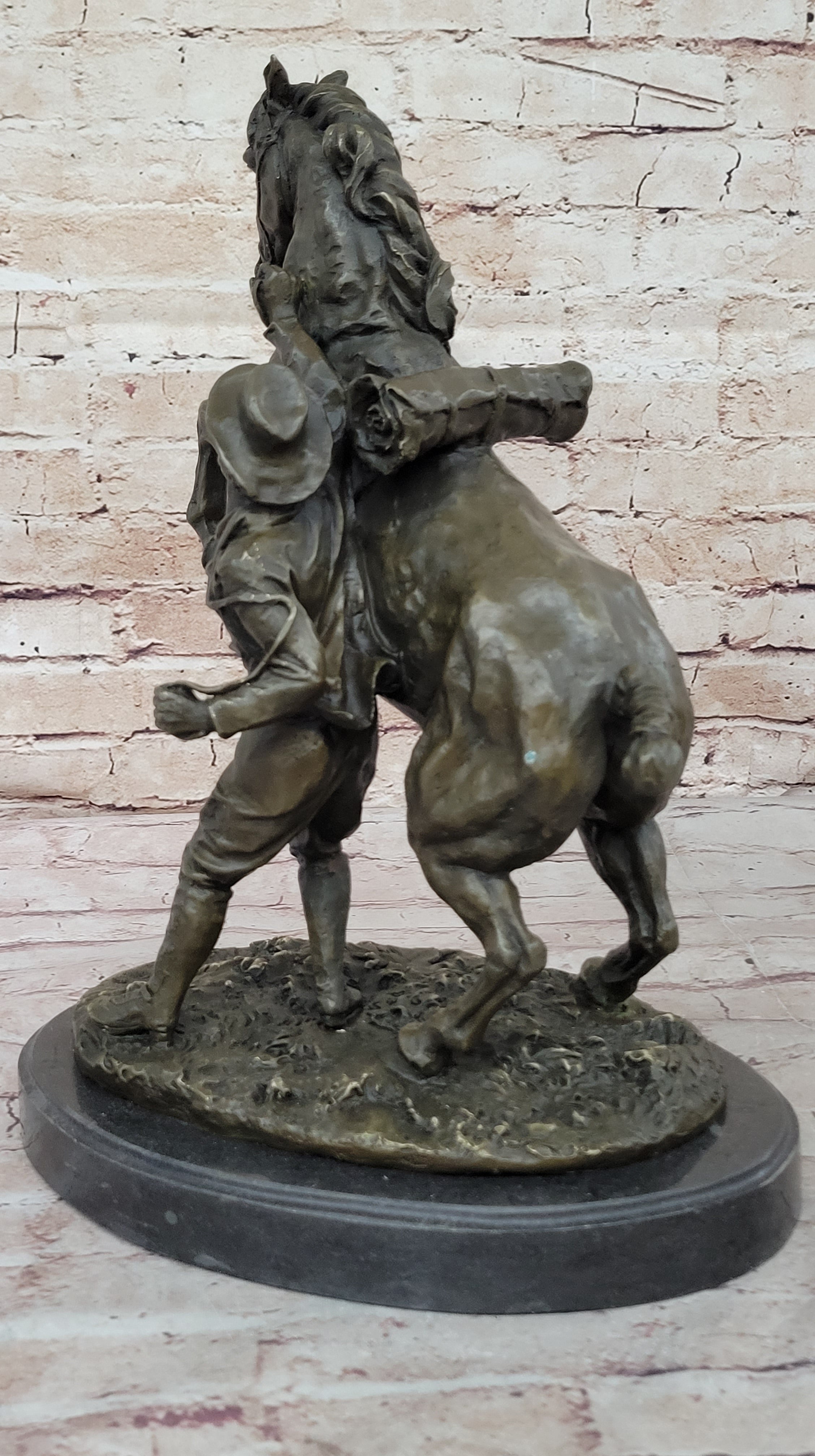 Bronze Sculpture of Cowboy Taming a Rearing Horse – Western Art