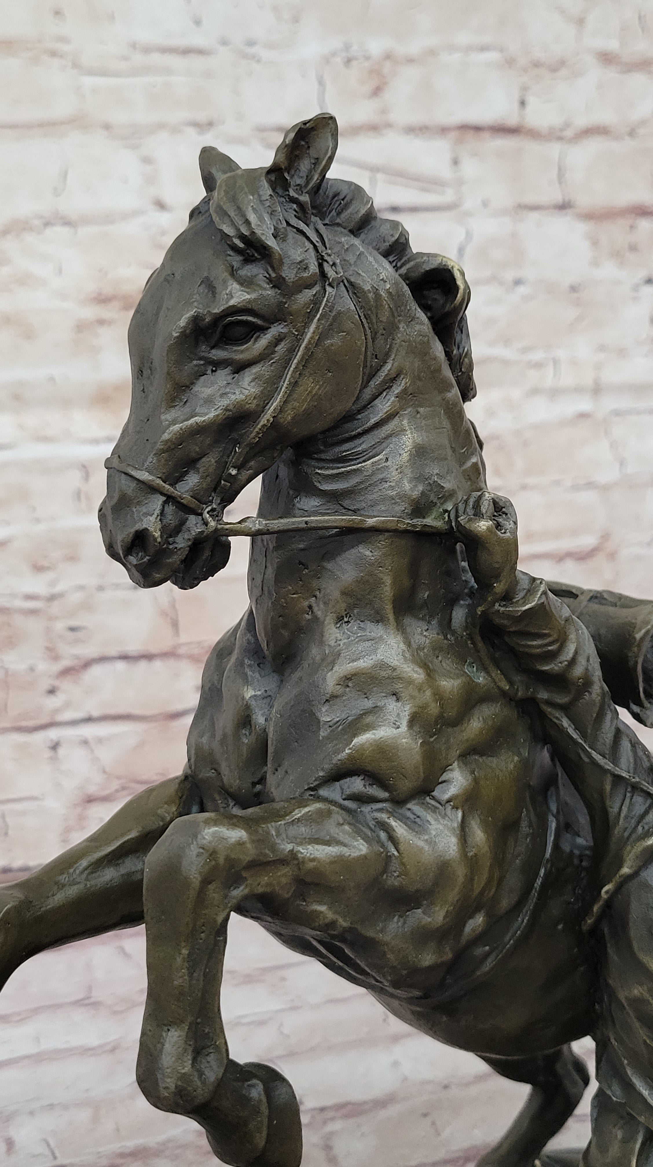Bronze Sculpture of Cowboy Taming a Rearing Horse – Western Art