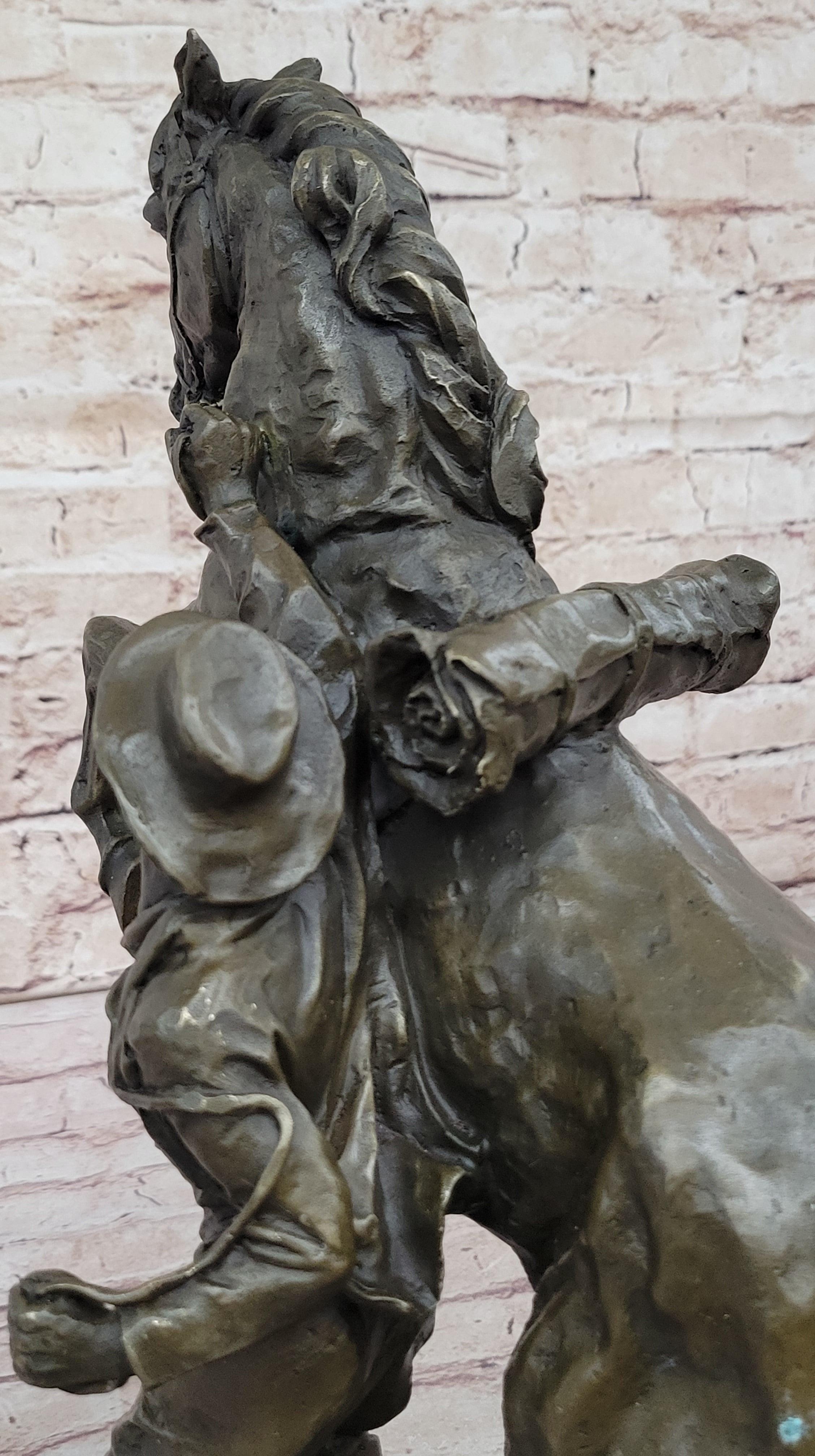Bronze Sculpture of Cowboy Taming a Rearing Horse – Western Art