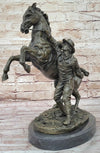 Bronze Sculpture of Cowboy Taming a Rearing Horse – Western Art