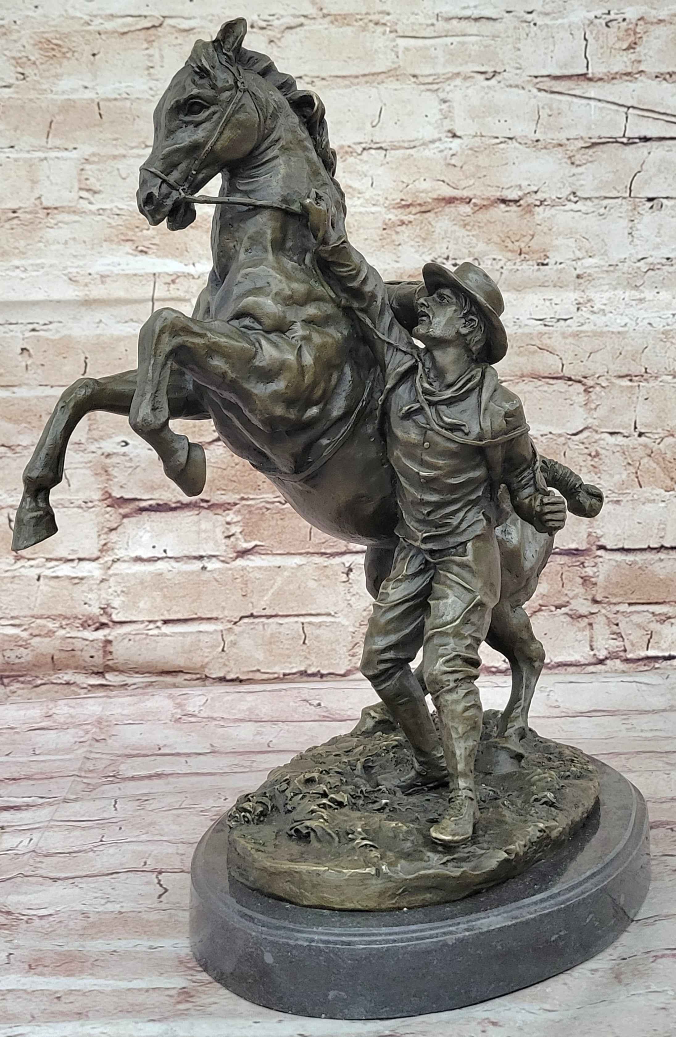 Bronze Sculpture of Cowboy Taming a Rearing Horse – Western Art