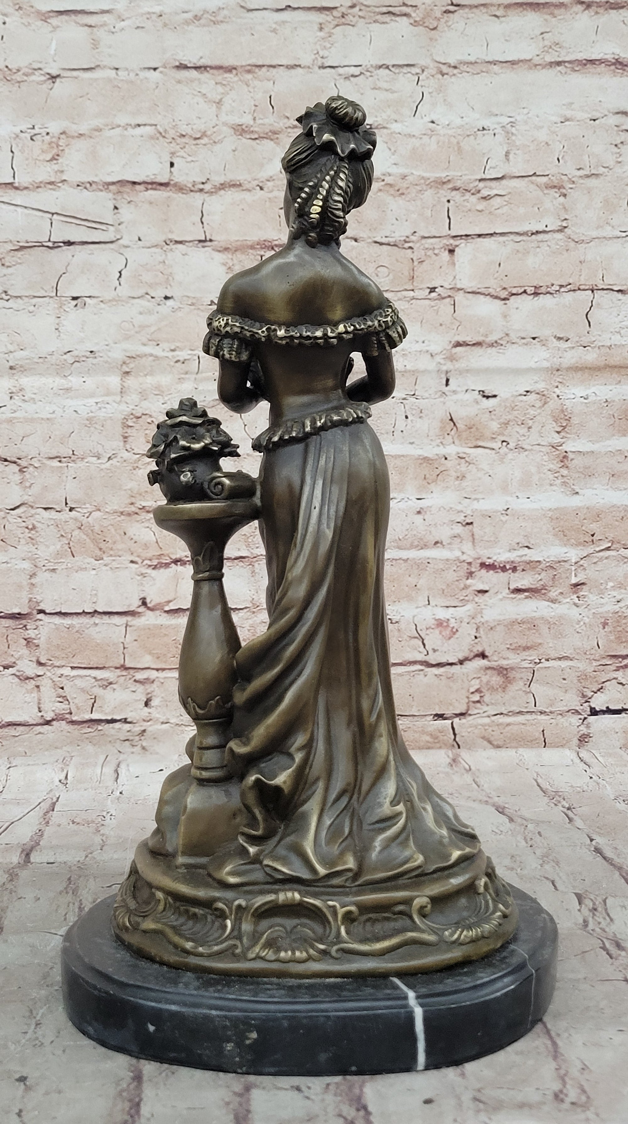 Victorian Edwardian Era European Young Woman Holding Puppy Dog - Bronze Sculpture by Milo