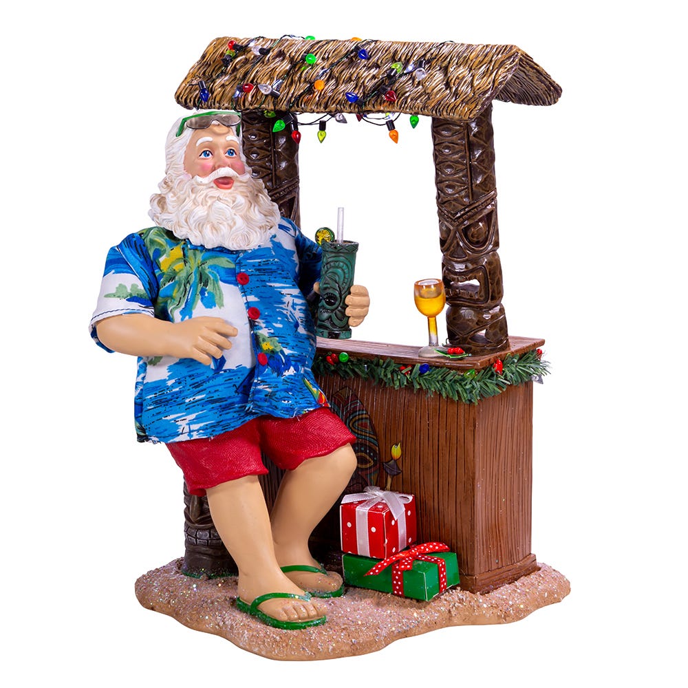 Kurt Adler 11-Inch Fabriché Beach Santa Sitting At Tiki Bar