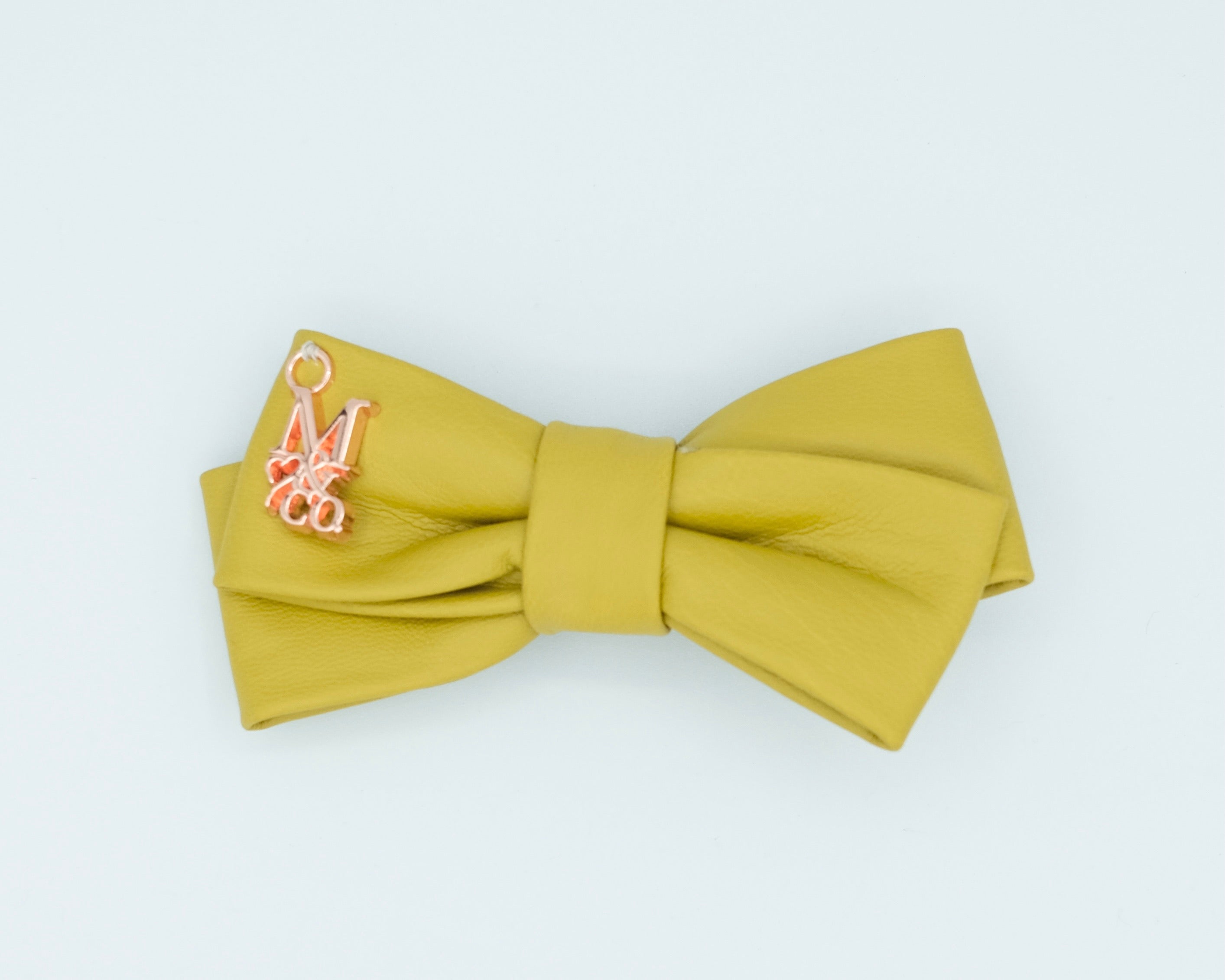 Leather Twist Bow: Medallion