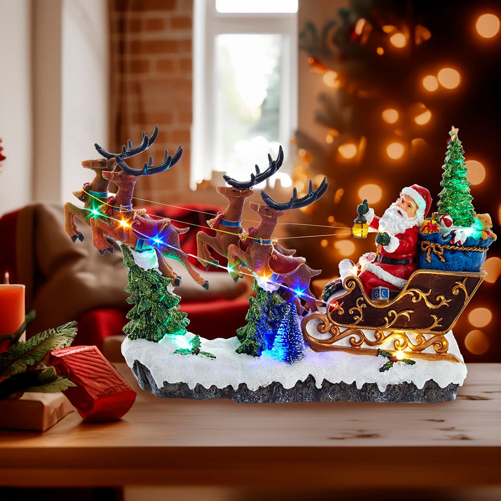 Kurt Adler 8.7-Inch Battery-Operated LED Musical Santa and Sleigh Table Piece